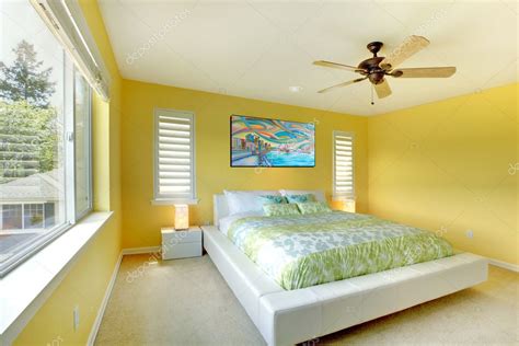 Yellow modern bedroom with white bed. Stock Photo by ©iriana88w 11406173