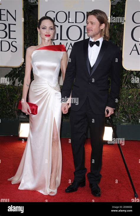 Angelina Jolie and Brad Pitt arriving for the 69th Annual Golden Globe