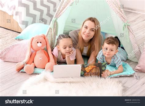 Nanny Cute Little Children Reading Book Stock Photo 1689901852