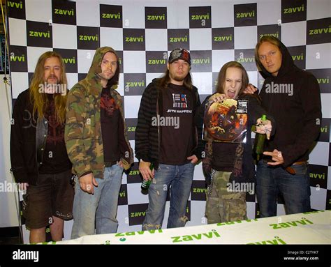 Finish metal band Children of Bodom signs copies of their new single 'Hellhounds on My Trail' at ...