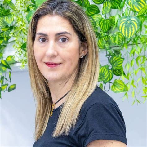Lady Shows Off Her Long Blonde Hair Before Getting A Makeover At The Hairdresser Stock Image