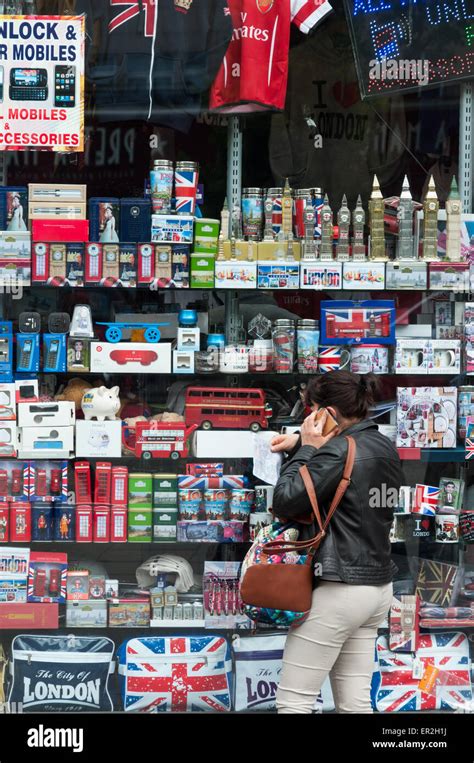 Tourist looking into a london souvenirs shop Stock Photo - Alamy