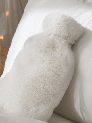Best Hot Water Bottles For Warming Up Soothing Cramps Glamour Uk