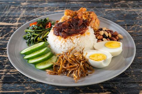 Nasi Lemak Is A Rice Dish Infused With Coconut Cream And Laden With