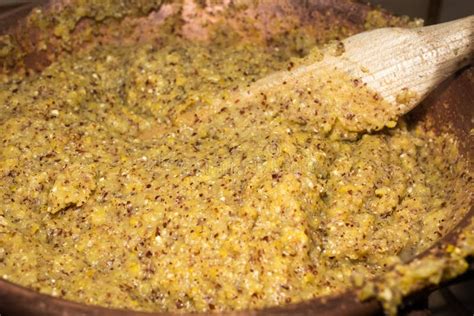 Polenta Cooking In The Traditional Cauldron Authentic Italian Recipe