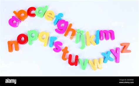 Colorful magnetic letters isolated on white Stock Photo - Alamy