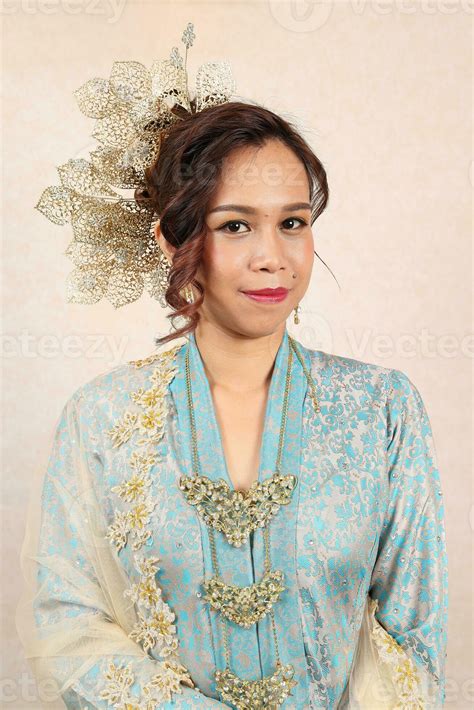 Beautiful Young Woman Wearing Mahsuri Style Baju Kebaya Labuh