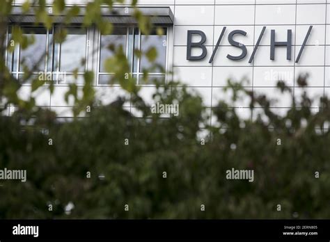 A logo sign outside of the headquarters of BSH Hausgeräte GmbH BSH