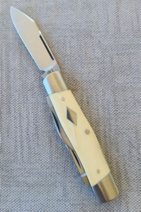 drt diamond edge cattleman knife  ivorycpmcoa  pouch