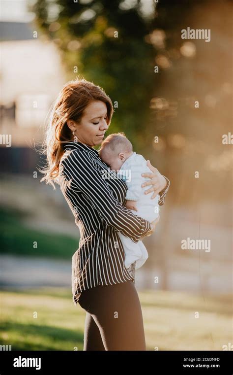 Young Mother And His Baby With Down Syndrome Stock Photo Alamy