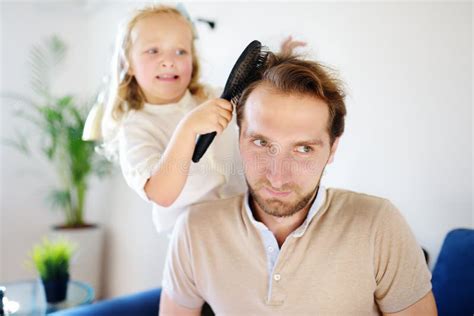 Little Curly Hair Daughter Making Funny Hairstyle for Her Young ...