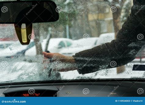 Cleaning Car S Windshield From Snow Winter Driving Stock Image Image