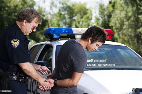 Under Arrest High-Res Stock Photo - Getty Images