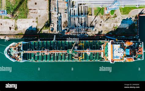 huge cargo ship  port bunkering refueling vessel  onward journey