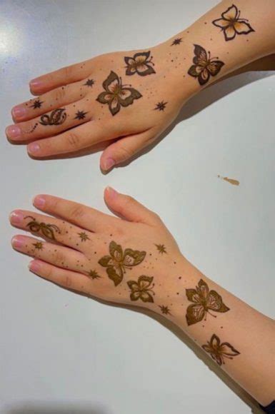 25 Mesmerizing Henna Designs Butterfly Henna On Hand Arm I Take You