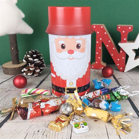 Boîte Père Noël remplie de bonbons et chocolats