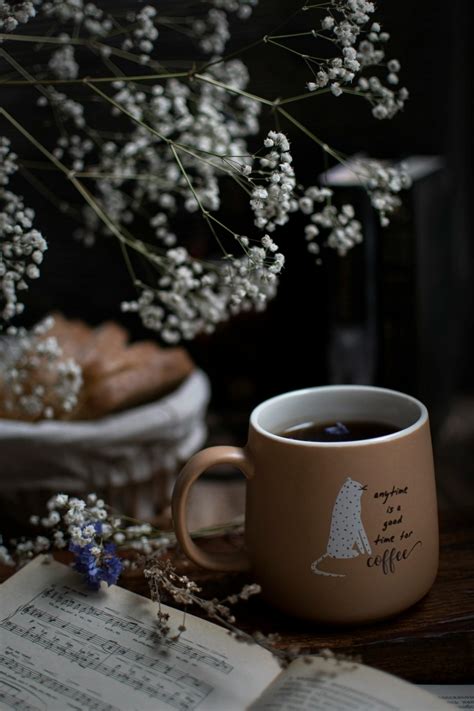 Tea in Cup, Music Sheet and Flowers · Free Stock Photo