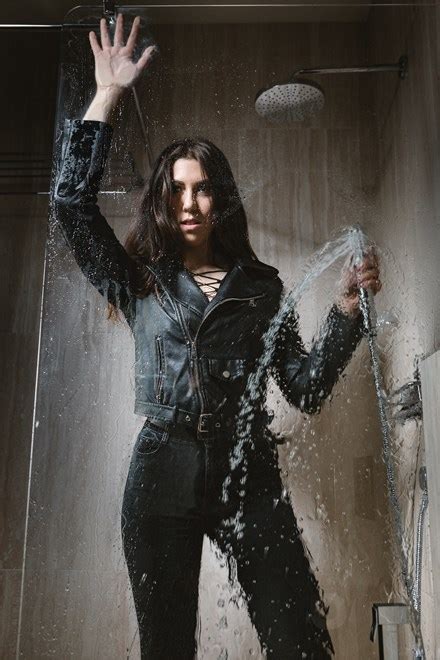 Wetlook Model In Skinny Jeans And Leather Jacket Got Soaking Wet In