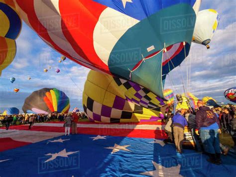 Crowd Of People Watching Stars And Stripes Hot Air Balloon Mass