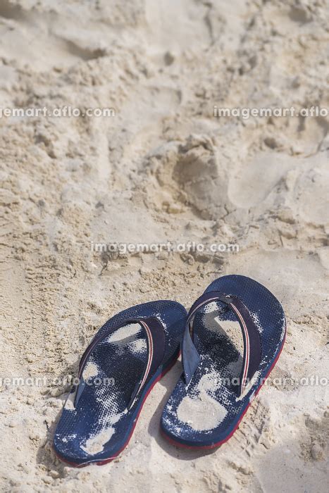 Pair of blue sandals at the beach Leisure conceptの写真素材 189920677