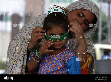 Rawalpindi Pakistan Th Aug A Girl Puts On A Pair Of Glasses