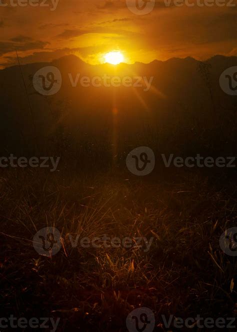 Picturesque golden hour sunset with mountain 24302126 Stock Photo at ...