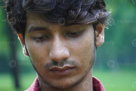 a sad boy face close up image 6784292 Stock Photo at Vecteezy