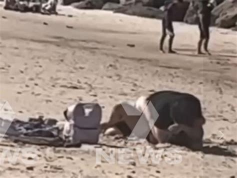 Couples Bizarre Act In Broad Daylight Stuns Adelaide Beachgoers Herald Sun