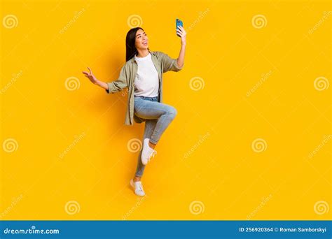 Full Size Portrait Of Excited Crazy Lady Hold Telephone Make Selfie