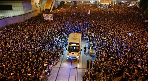 Ambulance Hong Kong Crowd Of Protesters In Hong Kong Parts Like The Red Sea To Make Way For