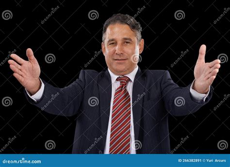 Welcoming You With Open Arms Portrait Of A Man In A Suit With His Arms