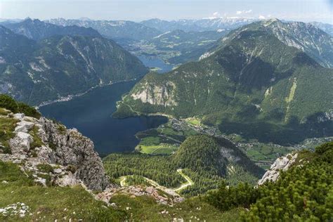 Tourists Looking Over Lake K Nigssee From Belvedere On The Mountain