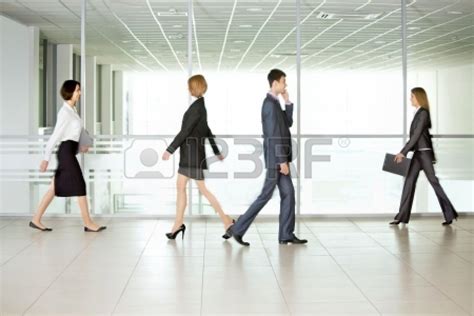 Business People Walking In The Office Corridor Stock Photography Ideas