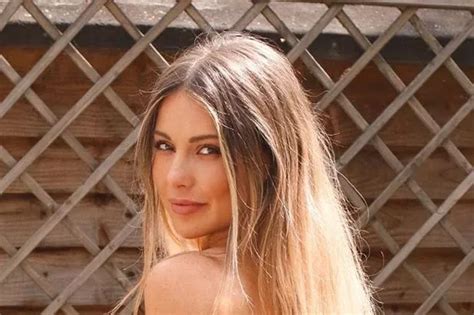 Louise Thompson topless exposé as she strips to thong bikini for sizzling display Daily Star