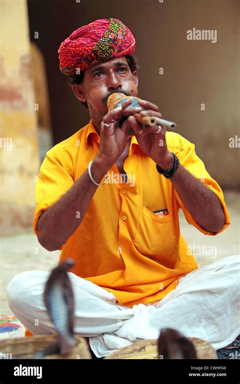 Snake Charmer playing Flute music Stock Photo - Alamy