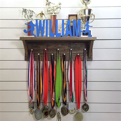 Personalized Trophy Shelf And Medal Holder Pinecone Home