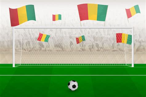 Guinea football team fans with flags of Guinea cheering on stadium ...