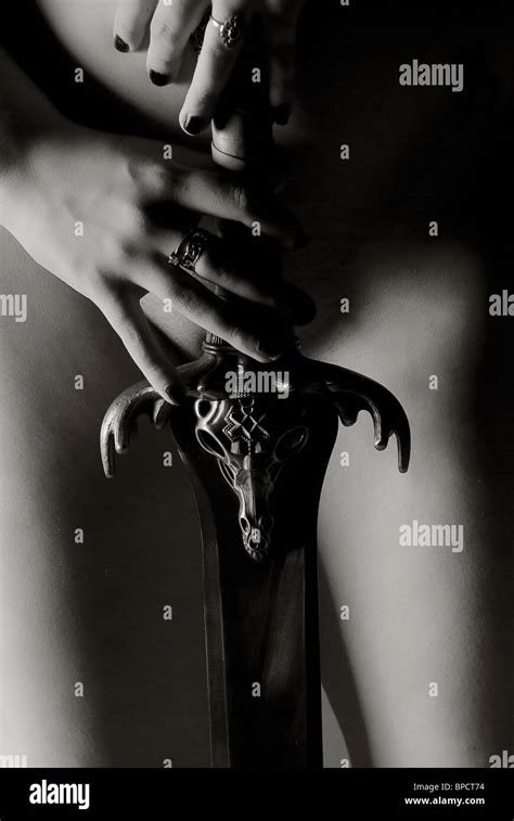 Nude Girl Holding Sword Stock Photo Alamy