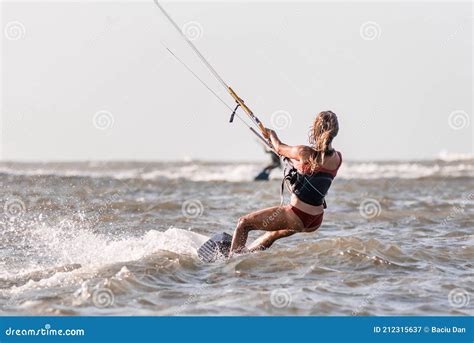Beautiful Caucasian Woman Kitesurfing Isolated On The Sea Sexy Girl Wearing Bikini Swim Wear