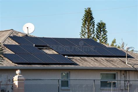 Photovoltaic Solar Panels on a Tiled Roof Stock Photo - Image of ...