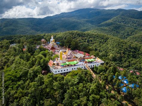 Aerial view of Wat Phra That Doi Kham Temple on the top of mountain in ...