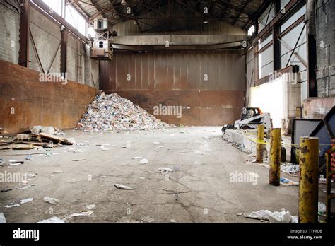 Heap of garbage at recycling plant Stock Photo - Alamy