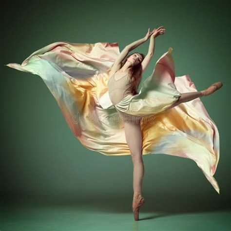 Portrait Of Beautiful Ballerina Dancer Wearing Colorful Dress Over