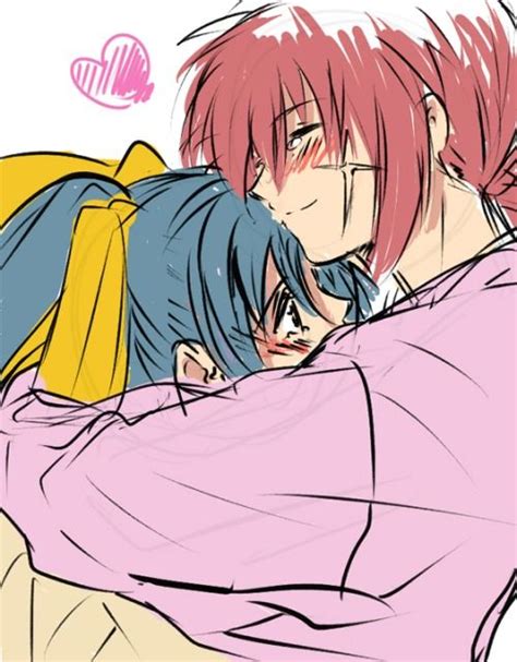 Two Anime Characters Hugging Each Other With Pink Hair