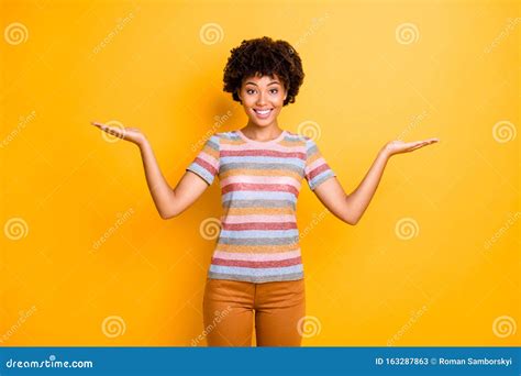 Photo Of Cheerful Toothy Beautiful Charming Sweet Girl Holding Two