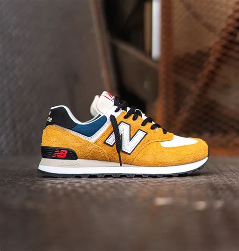 ew Balance 574 "Marigold" On Sale For $47.99 — Kicks Under Cost