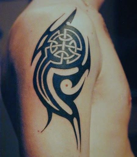 Celtic tribal tattoos on bicep. - Blurmark