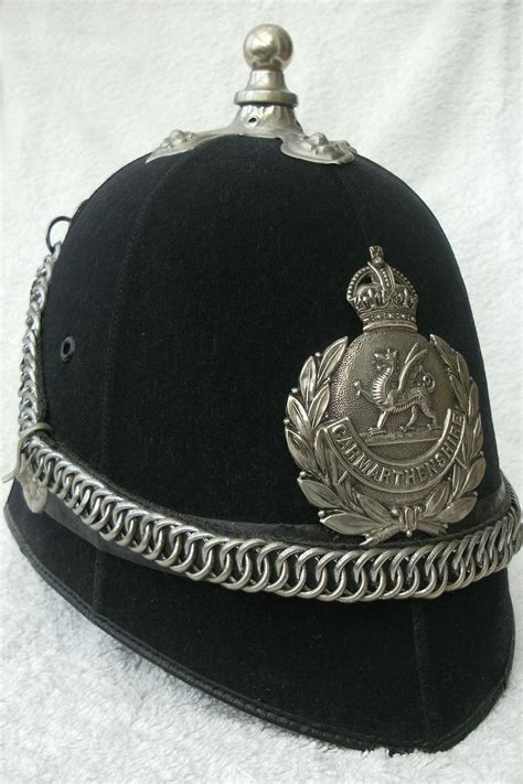 Carmarthenshire Constabulary Post 1910 Police Helmet Police Badge