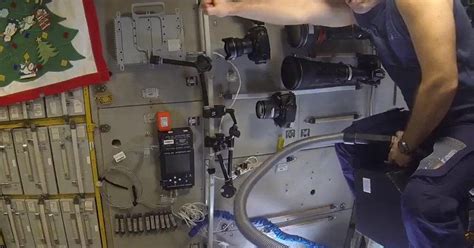 ISS cosmonaut rides vacuum cleaner like a horse in space - CNET