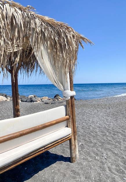 Premium Photo | Beach chairs and umbrella